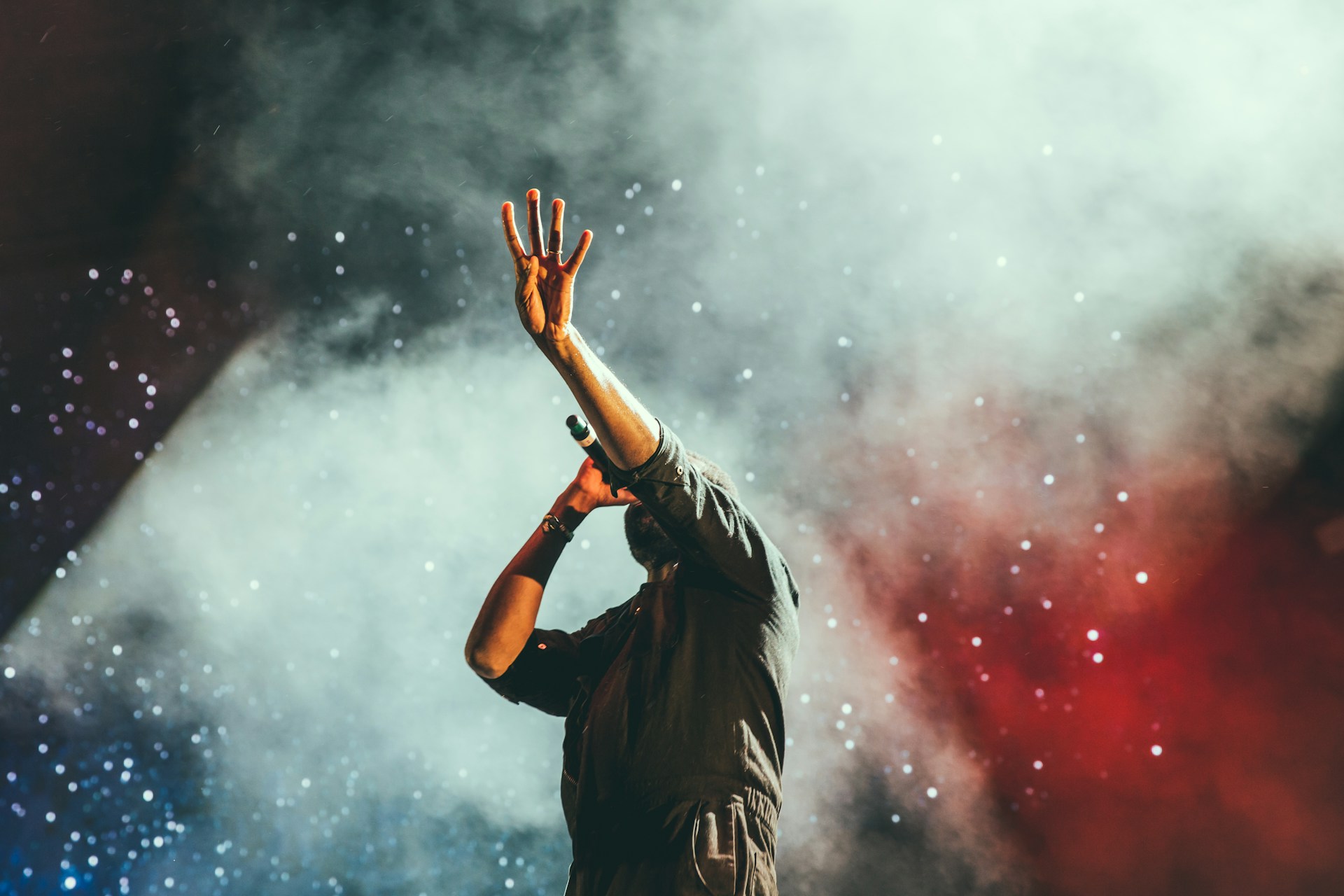 Live concert with dramatic stage lighting